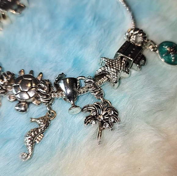 Silver tone charm bracelet, travel beach theme 7 to 8 in - Picture 3 of 9